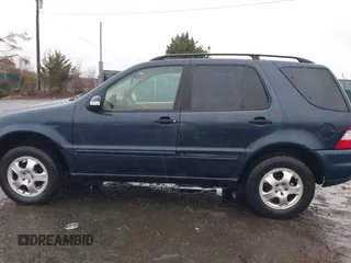 2003 Mercedes-Benz M-Class 3.2L with VIN 4JGAB54EX3A390987, listed as a IAAI auction lot 41482335 with 191,381 mi miles. Bid and sale history available at carsss.com. Image 14.