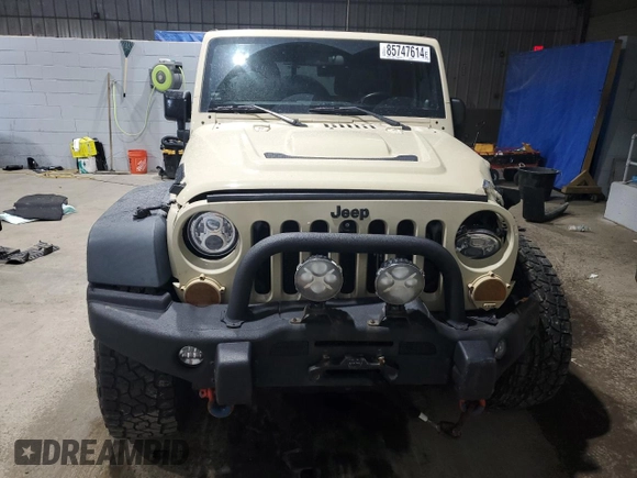 2012 Jeep Wrangler Unlimited Call of Duty MW3 with VIN 1C4BJWFGXCL105130, listed as a Copart auction lot 85747614 with 77,953 mi miles and Salvage title. Bid and sale history available at DreamBid. Image 5.