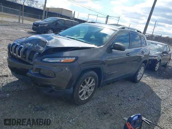 2018 Jeep Cherokee Latitude Plus with VIN 1C4PJLLXXJD606504, listed as a IAAI auction lot 41731085 with 95,569 mi miles. Bid and sale history available at carsss.com. Image 2.