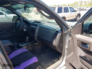 2011 Ford Escape Limited with VIN 1FMCU0EG0BKA61472, listed as a IAAI auction lot 41982614 with 291,808 mi miles. Bid and sale history available at carsss.com. Image 5.