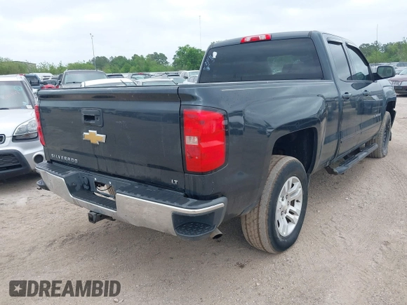 2018 Chevrolet Silverado 1500 LT with VIN 1GCRCREC9JZ105218, listed as a IAAI auction lot 40778682 with 124,621 mi miles and . Bid and sale history available at DreamBid. Image 4.