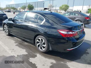 2016 Honda Accord Sedan EX with VIN 1HGCR2F71GA223298, listed as a IAAI auction lot 41976282 with 121,117 mi miles. Bid and sale history available at carsss.com. Image 3.