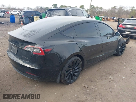 2023 Tesla Model 3 Long Range with VIN 5YJ3E1EB6PF673532, listed as a IAAI auction lot 41885716 with 39,690 mi miles and . Bid and sale history available at DreamBid. Image 4.