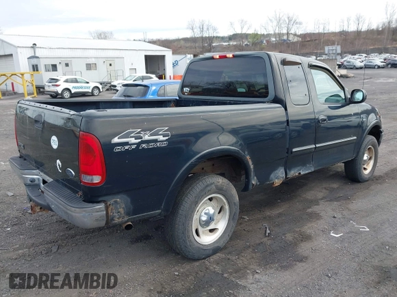 2000 Ford F-150 XL with VIN 1FTRX18WXYNC25817, listed as a IAAI auction lot 41976618 with 148,794 mi miles and . Bid and sale history available at DreamBid. Image 4.