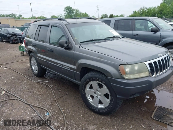 2003 Jeep Grand Cherokee Laredo z VIN 1J4GW48S73C545863, wystawiony jako IAAI lot #42222247 z przebiegiem 128 529 mil mil oraz . Historia ofert i sprzedaży dostępna na DreamBid. Obrazek 1.