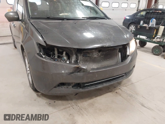 2015 Honda Odyssey EX-L with VIN 5FNRL5H64FB055890, listed as a IAAI auction lot 41706141 with 155,167 mi miles and . Bid and sale history available at carsss.com. Image 6.