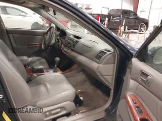2003 Toyota Camry LE with VIN 4T1BE30K03U152348, listed as a IAAI auction lot 42082892 with 224,721 mi miles and . Bid and sale history available at DreamBid. Image 5.
