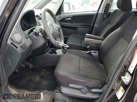 2011 Suzuki SX4 with VIN JS2YC5A44B6300171, listed as a Copart auction lot 87673685 with 116,483 mi miles and Salvage Title. Bid and sale history available at DreamBid. Image 7.