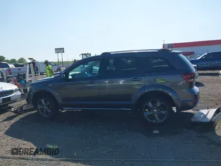 2015 Dodge Journey Crossroad with VIN 3C4PDCGB3FT739211, listed as a IAAI auction lot 42027048 with 180,716 mi miles and . Bid and sale history available at DreamBid. Image 14.
