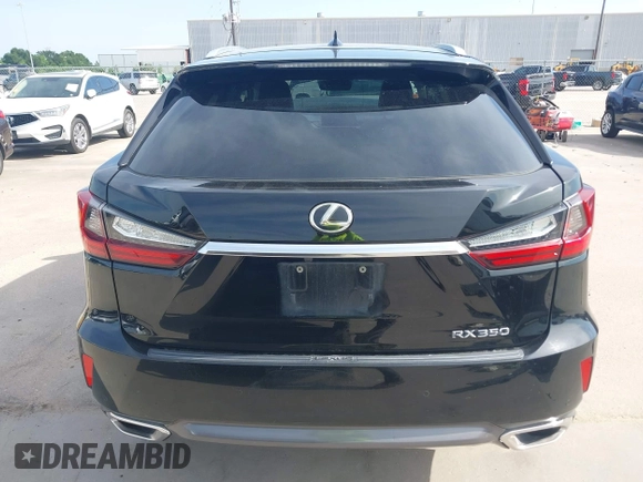 2016 Lexus RX 350 z VIN 2T2BZMCA4GC047800, wystawiony jako IAAI lot #42270406 z przebiegiem 112 181 mil mil oraz . Historia ofert i sprzedaży dostępna na DreamBid. Obrazek 16.