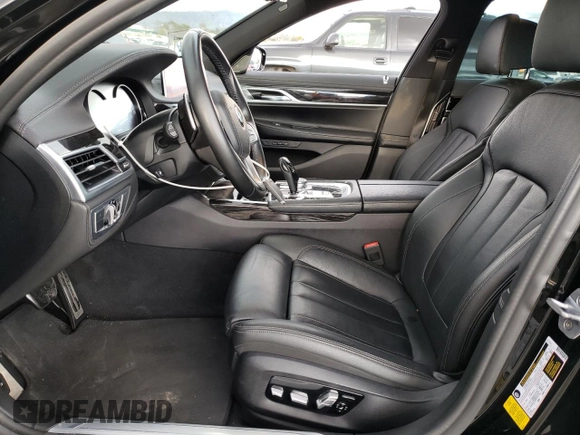 2019 BMW 7 Series 740i with VIN WBA7E2C55KB217499, listed as a Copart auction lot 43136573 with 36,419 mi miles. Bid and sale history available at carsss.com. Image 7.