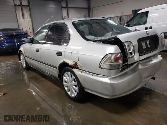 1996 Honda Civic LX "O" w/Air with VIN 2HGEJ6672TH544494, listed as a Copart auction lot 85801094 with 183,647 mi miles and Salvage Title. Bid and sale history available at carsss.com. Image 2.