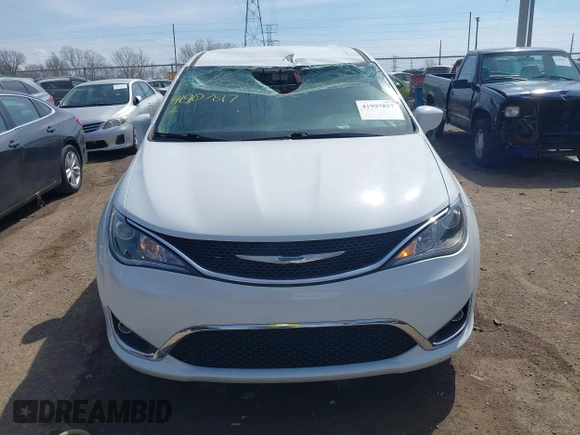 2018 Chrysler Pacifica Touring Plus with VIN 2C4RC1FG8JR125229, listed as a IAAI auction lot 41907817 with 107,914 mi miles and . Bid and sale history available at DreamBid. Image 12.