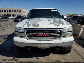1999 GMC New Sierra 1500 SLE with VIN 2GTEK19T8X1550662, listed as a Copart auction lot 75829934 with 341,510 mi miles and Salvage Title. Bid and sale history available at carsss.com. Image 5.