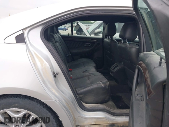 2015 Ford Taurus Limited with VIN 1FAHP2F81FG171224, listed as a IAAI auction lot 42250645 with 125,395 mi miles and . Bid and sale history available at DreamBid. Image 8.