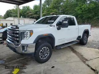 2022 GMC Sierra 2500HD SLE z VIN 1GT59ME72NF355264, wystawiony jako Copart lot #60138445 z przebiegiem 121 466 mil mil oraz Czysty tytuł • Clean title. Historia ofert i sprzedaży dostępna na DreamBid. Obrazek 1.