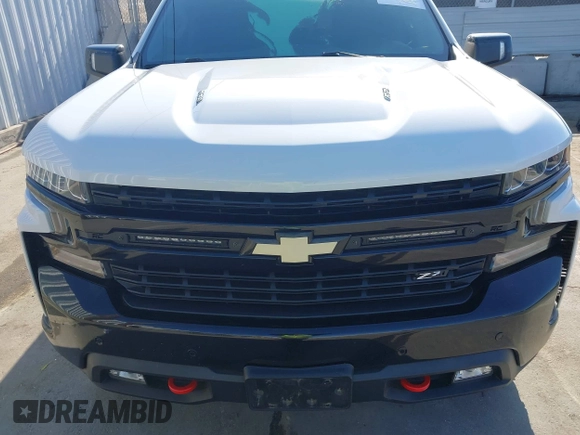 2021 Chevrolet Silverado 1500 LT Trail Boss with VIN 1GCPYFEL3MZ129400, listed as a IAAI auction lot 42024225 with 73,571 mi miles and . Bid and sale history available at DreamBid. Image 6.