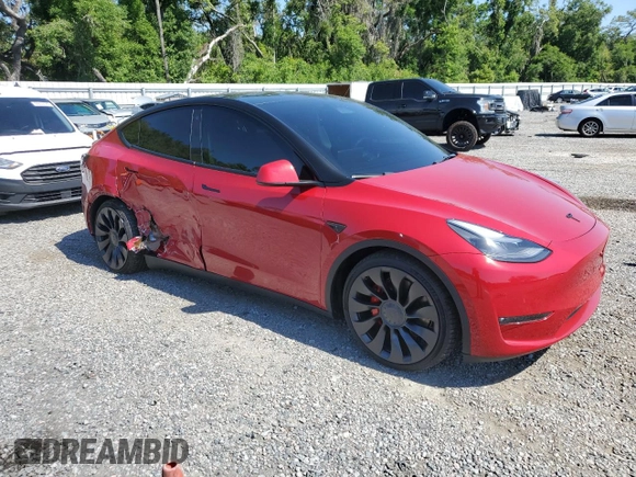 2022 Tesla Model Y Performance with VIN 7SAYGDEF9NF452155, listed as a Copart auction lot 52068895 with 42,072 mi miles and Salvage title. Bid and sale history available at DreamBid. Image 4.