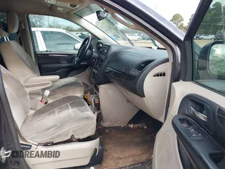 2014 Dodge Grand Caravan American Value with VIN 2C4RDGBG7ER102603, listed as a IAAI auction lot 41278072 with Not Provided miles and . Bid and sale history available at DreamBid. Image 5.