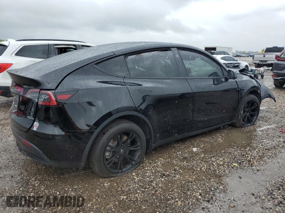 2024 Tesla Model Y z VIN 7SAYGDED7RF018059, wystawiony jako Copart lot #54273785 z przebiegiem 30 080 mil mil oraz Szkoda całkowita • Salvage title. Historia ofert i sprzedaży dostępna na DreamBid. Obrazek 3.