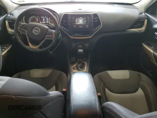 2017 Jeep Cherokee Altitude with VIN 1C4PJLABXHW586048, listed as a Copart auction lot 62674745 with 106,334 mi miles and Salvage title. Bid and sale history available at DreamBid. Image 8.