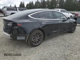 2019 Tesla Model 3 Mid Range z VIN 5YJ3E1EAXKF422500, wystawiony jako Copart lot #56065665 z przebiegiem 72 781 mil mil oraz Szkoda całkowita • Salvage title. Historia ofert i sprzedaży dostępna na DreamBid. Obrazek 3.