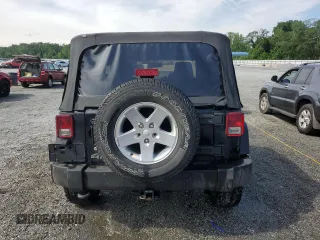 2014 Jeep Wrangler Sport z VIN 1C4AJWAG0EL147523, wystawiony jako Copart lot #59682015 z przebiegiem 196 258 mil mil oraz Szkoda całkowita • Salvage title. Historia ofert i sprzedaży dostępna na DreamBid. Obrazek 6.