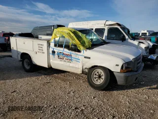 1999 Ford F-250 with VIN 1FDNF20L3XED36521, listed as a Copart auction lot 79300994 with 253,493 mi miles and Salvage title. Bid and sale history available at DreamBid. Image 4.