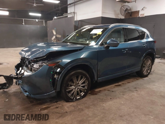 2023 Mazda CX-5 Signature with VIN JM3KFBXY4P0120187, listed as a IAAI auction lot 41706264 with 9,402 mi miles and . Bid and sale history available at carsss.com. Image 2.