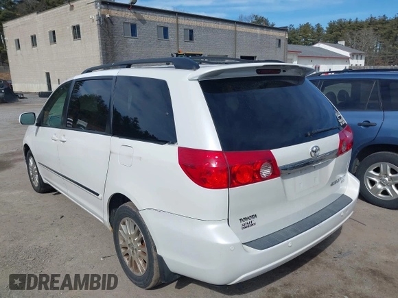 2008 Toyota Sienna XLE with VIN 5TDBK22C28S012097, listed as a IAAI auction lot 41758136 with 203,888 mi miles and . Bid and sale history available at DreamBid. Image 3.