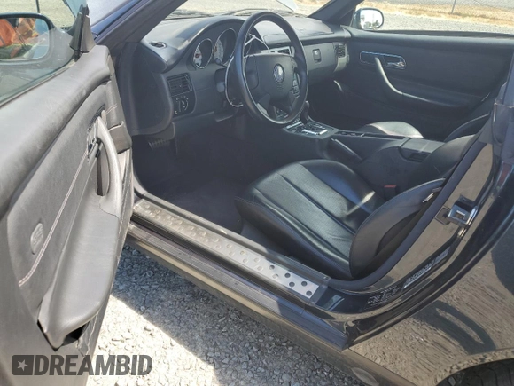 1998 Mercedes-Benz SLK-Class with VIN WDBKK47F6WF027941, listed as a Copart auction lot 68139324 with 63,396 mi miles and Salvage Title. Bid and sale history available at carsss.com. Image 8.