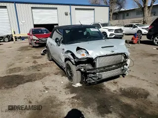 2012 MINI Convertible S z VIN WMWZP3C58CT550106, wystawiony jako Copart lot #45629035 z przebiegiem 104 851 mil mil oraz Szkoda całkowita • Salvage title. Historia ofert i sprzedaży dostępna na DreamBid. Obrazek 11.
