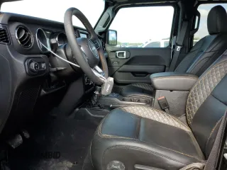2023 Jeep Gladiator High Altitude z VIN 1C6HJTFG1PL591347, wystawiony jako Copart lot #52847825 z przebiegiem 9 854 mil mil oraz Szkoda całkowita • Salvage title. Historia ofert i sprzedaży dostępna na DreamBid. Obrazek 7.