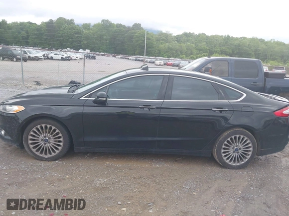 2016 Ford Fusion Titanium with VIN 3FA6P0K97GR118922, listed as a IAAI auction lot 42121212 with 256,584 mi miles and . Bid and sale history available at DreamBid. Image 14.