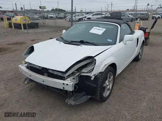 2003 Toyota MR2 Spyder with VIN JTDFR320X30062525, listed as a IAAI auction lot 41558074 with 42,493 mi miles. Bid and sale history available at carsss.com. Image 2.
