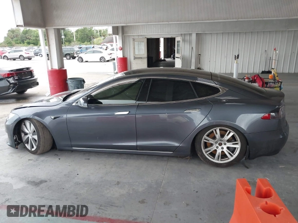 2021 Tesla Model S Long Range Plus with VIN 5YJSA1E28MF421655, listed as a IAAI auction lot 42407234 with 111,443 mi miles and . Bid and sale history available at DreamBid. Image 14.