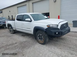 2019 Toyota Tacoma 4WD SR5 with VIN 3TMDZ5BNXKM074085, listed as a IAAI auction lot 41536469 with 78,505 mi miles. Bid and sale history available at carsss.com. Image 1.