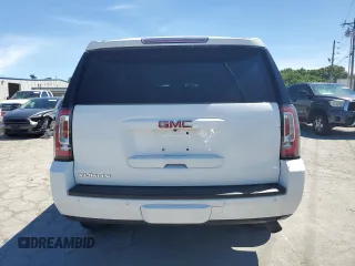 2016 GMC Yukon SLT with VIN 1GKS1BKCXGR439435, listed as a Copart auction lot 61202804 with 168,196 mi miles and Salvage Title. Bid and sale history available at carsss.com. Image 6.