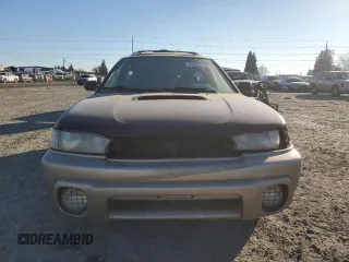 1999 Subaru Legacy Outback z VIN 4S3BG6853X7603582, wystawiony jako Copart lot #42632735 z przebiegiem 183 424 mil mil oraz Szkoda całkowita • Salvage title. Historia ofert i sprzedaży dostępna na DreamBid. Obrazek 5.