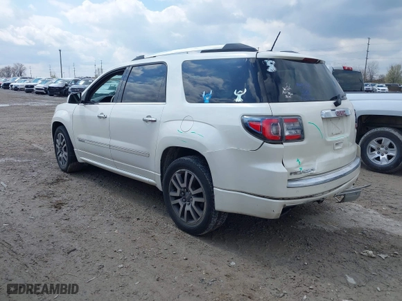 2014 GMC Acadia Denali with VIN 1GKKVTKD3EJ138763, listed as a IAAI auction lot 42011739 with 142,894 mi miles. Bid and sale history available at carsss.com. Image 3.