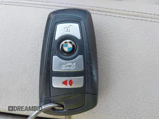 2013 BMW 5 Series 528i xDrive with VIN WBAXH5C50DD108318, listed as a IAAI auction lot 42131197 with 72,119 mi miles. Bid and sale history available at carsss.com. Image 11.