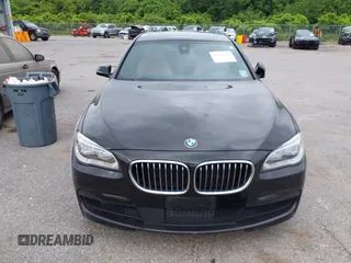 2014 BMW 7 Series 740Li with VIN WBAYE4C51ED138744, listed as a IAAI auction lot 42254213 with 116,157 mi miles and . Bid and sale history available at DreamBid. Image 12.