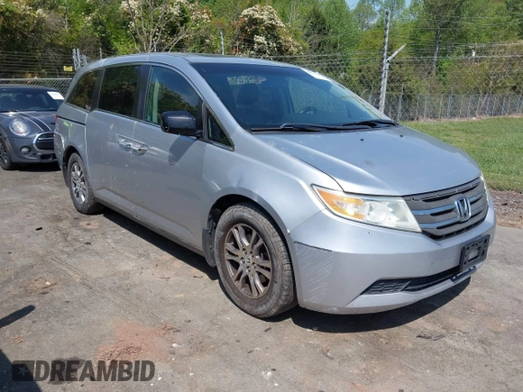 2011 Honda Odyssey EX-L with VIN 5FNRL5H62BB075789, listed as a IAAI auction lot 42035746 with 238,616 mi miles and . Bid and sale history available at carsss.com. Image 1.
