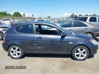 2007 Hyundai Accent SE with VIN KMHCN36C37U031369, listed as a IAAI auction lot 42093760 with 95,919 mi miles. Bid and sale history available at carsss.com. Image 13.
