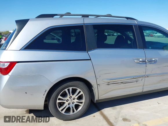 2012 Honda Odyssey EX with VIN 5FNRL5H48CB131881, listed as a IAAI auction lot 41822159 with 354,718 mi miles and . Bid and sale history available at DreamBid. Image 17.