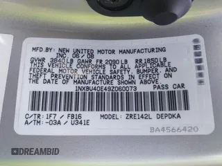 2009 Toyota Corolla with VIN 1NXBU40E49Z060073, listed as a IAAI auction lot 42152619 with 43,540 mi miles. Bid and sale history available at carsss.com. Image 9.