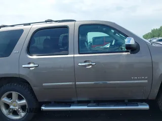 2013 Chevrolet Tahoe LTZ with VIN 1GNSKCE0XDR373858, listed as a IAAI auction lot 42456875 with 297,084 mi miles and . Bid and sale history available at DreamBid. Image 13.