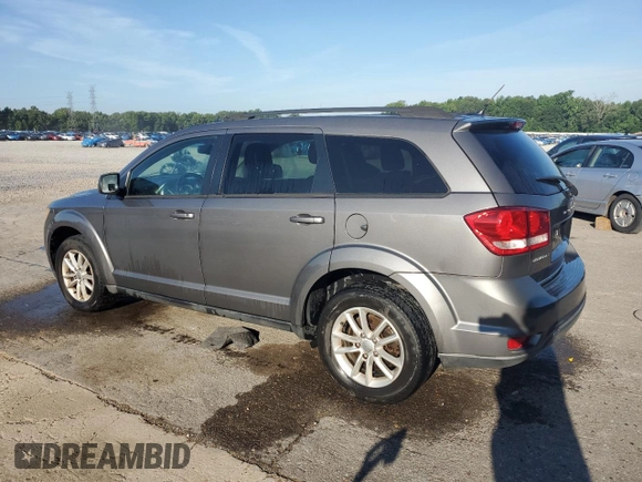 2013 Dodge Journey SXT with VIN 3C4PDCBG0DT522408, listed as a Copart auction lot 62699195 with 130,665 mi miles and Salvage title. Bid and sale history available at DreamBid. Image 2.