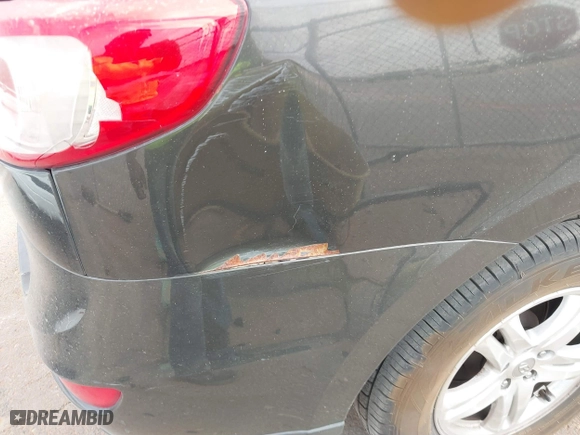 2012 Hyundai Santa Fe GLS with VIN 5XYZG3AB2CG128873, listed as a IAAI auction lot 41874808 with 182,453 mi miles. Bid and sale history available at carsss.com. Image 6.