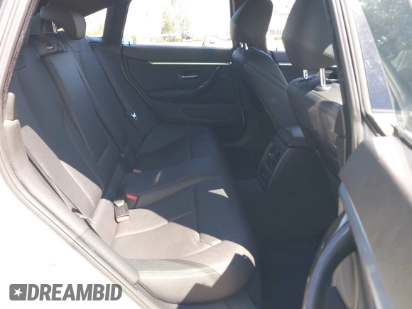 2017 BMW 4 Series 430i with VIN WBA4F7C31HG789340, listed as a IAAI auction lot 41871217 with 97,971 mi miles and . Bid and sale history available at DreamBid. Image 8.